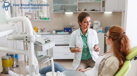 dentist talking to patient